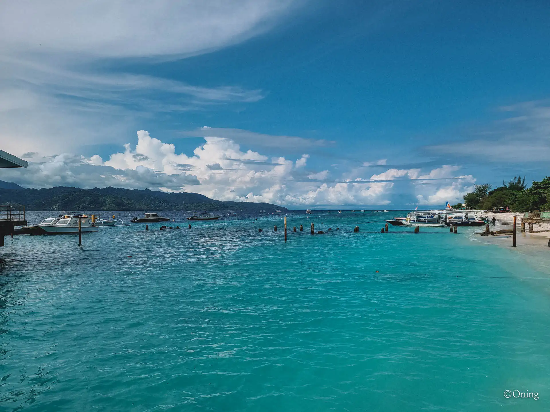 Gili Trawangan island, a small tropical island near Bali where crystal-clear waters meet vibrant nightlife. 22 gili trawangan harbor