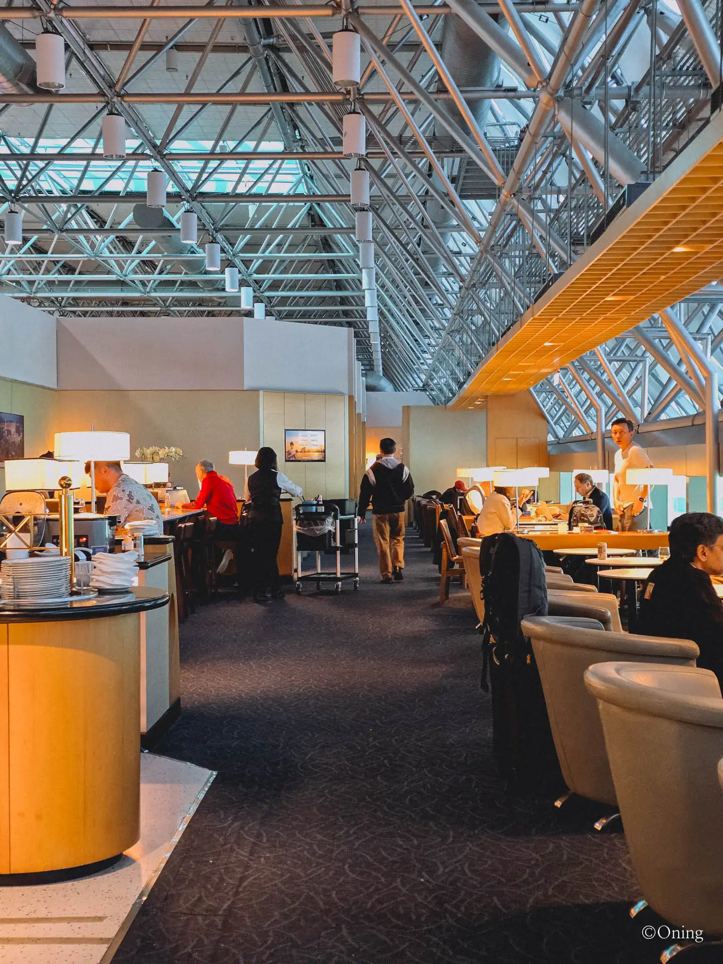 Interior of the SilverKris Lounge at Taoyuan Airport Terminal 2 with seating under a glass roof