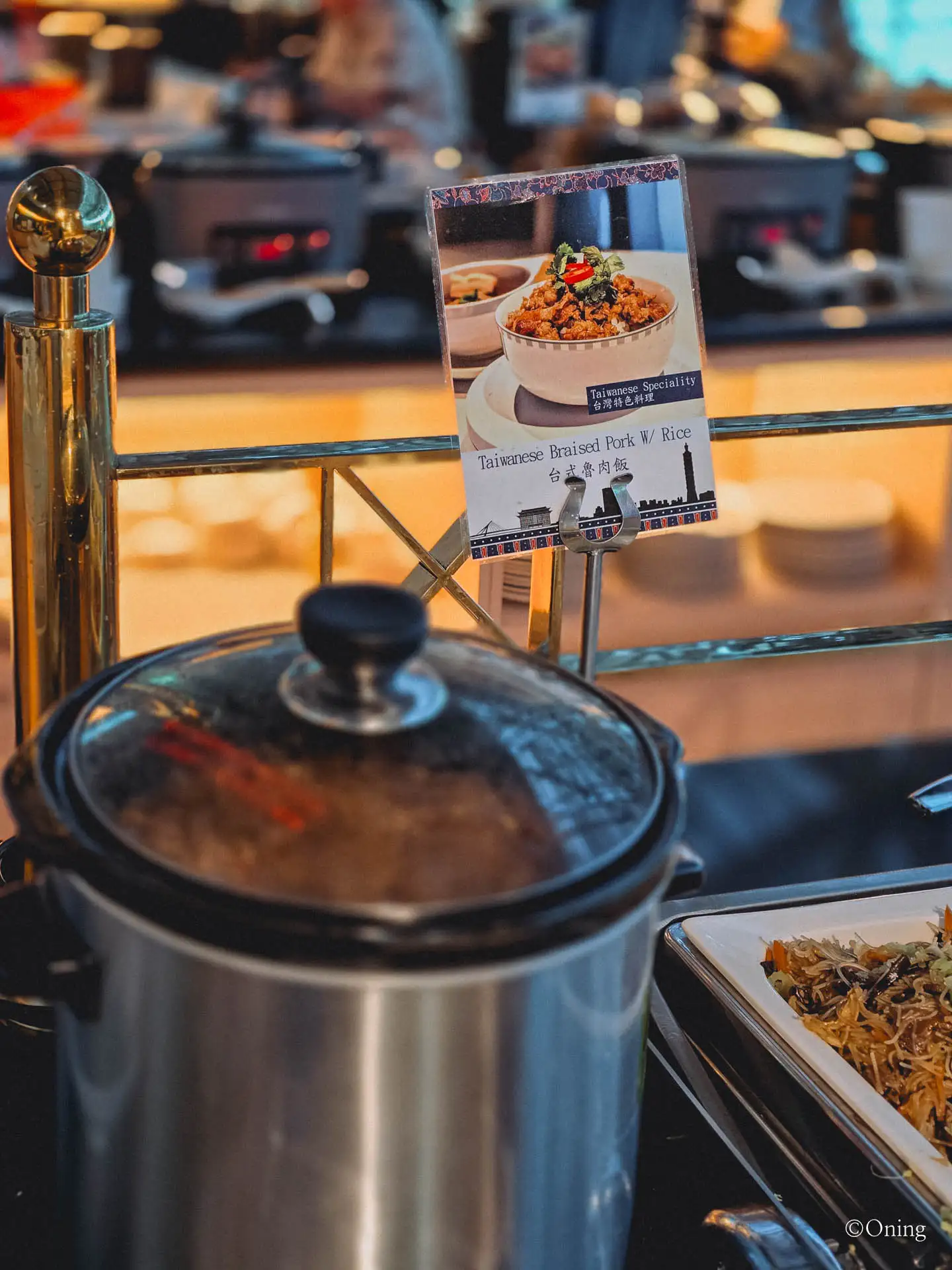 Buffet sign for Taiwanese Braised Pork with Rice on a slow cooker at the lounge